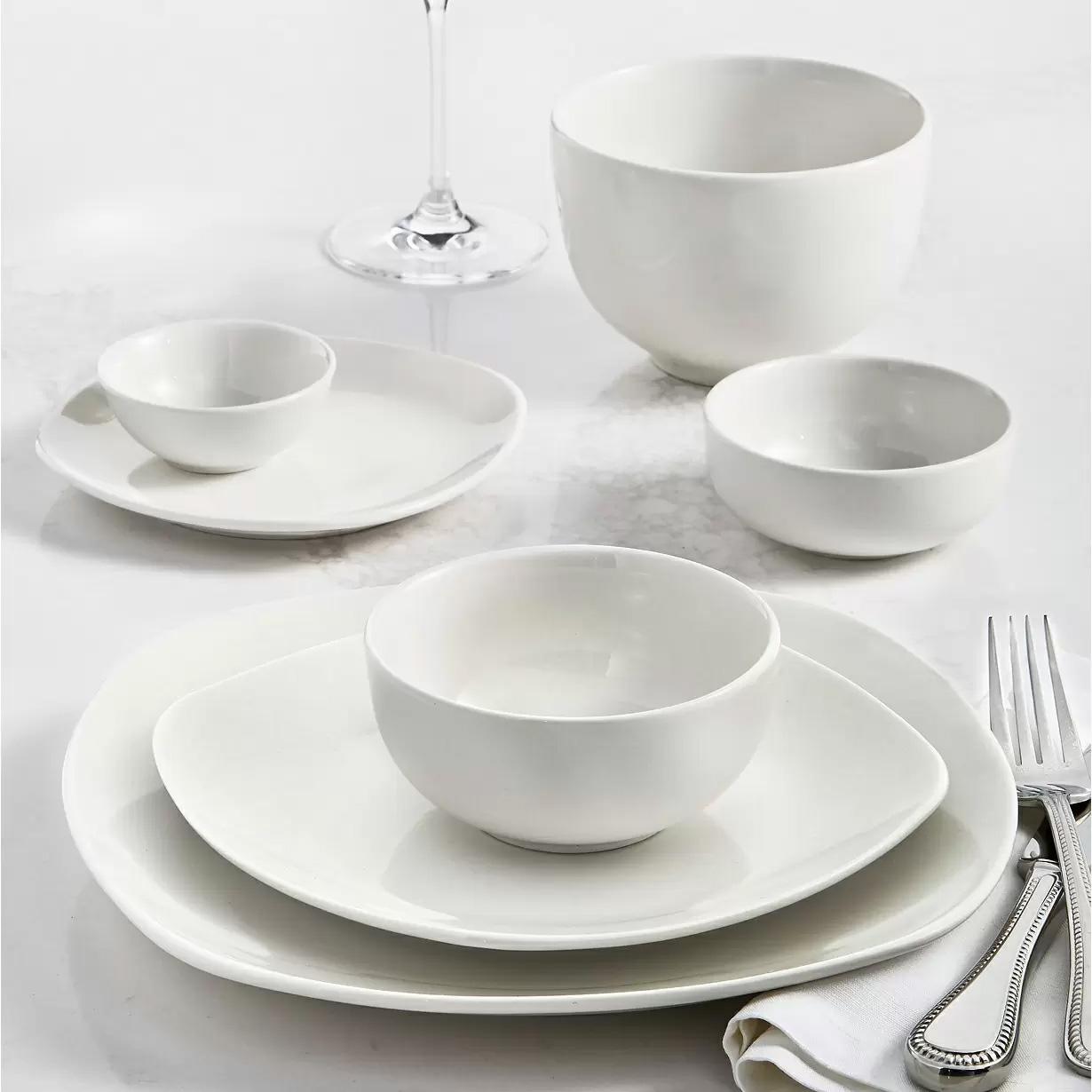 42-Piece Tabletops Unlimited Inspiration Whiteware Dinnerware Set for $37.99 Shipped