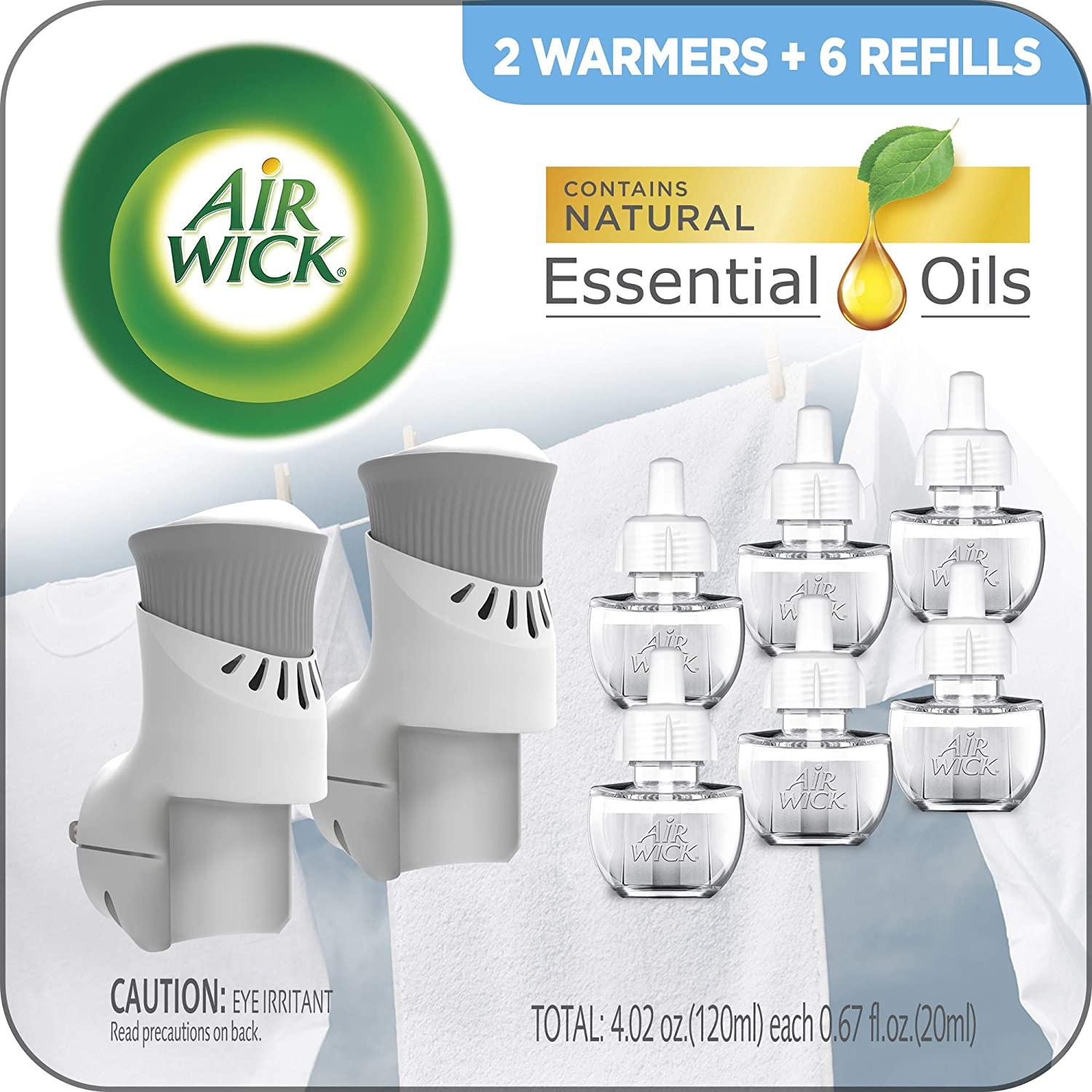 Air Wick Plug in Scented Oil Starter Kit 2 Warmers for $10.49