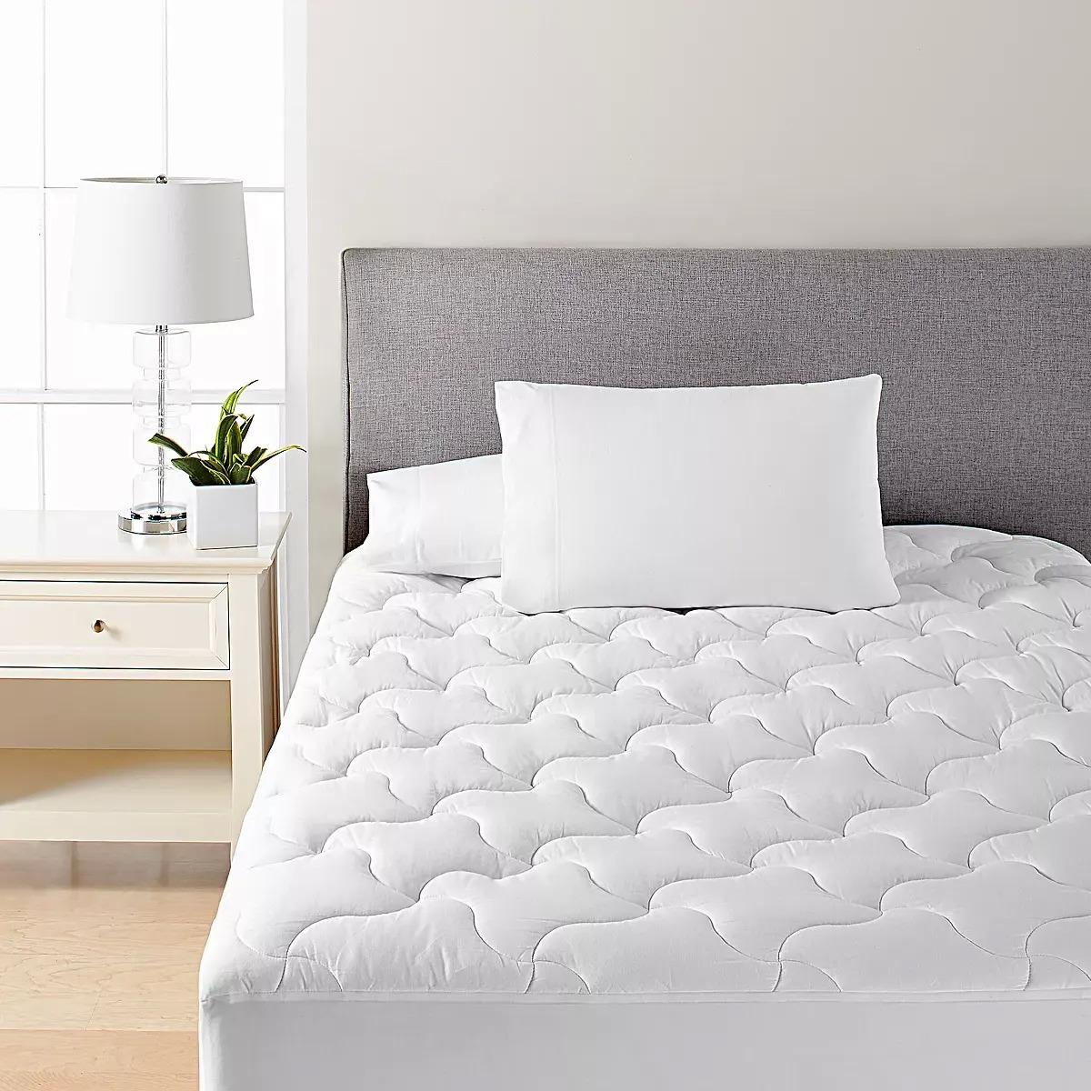 Martha Stewart Essentials Mattress Pads for $9.99