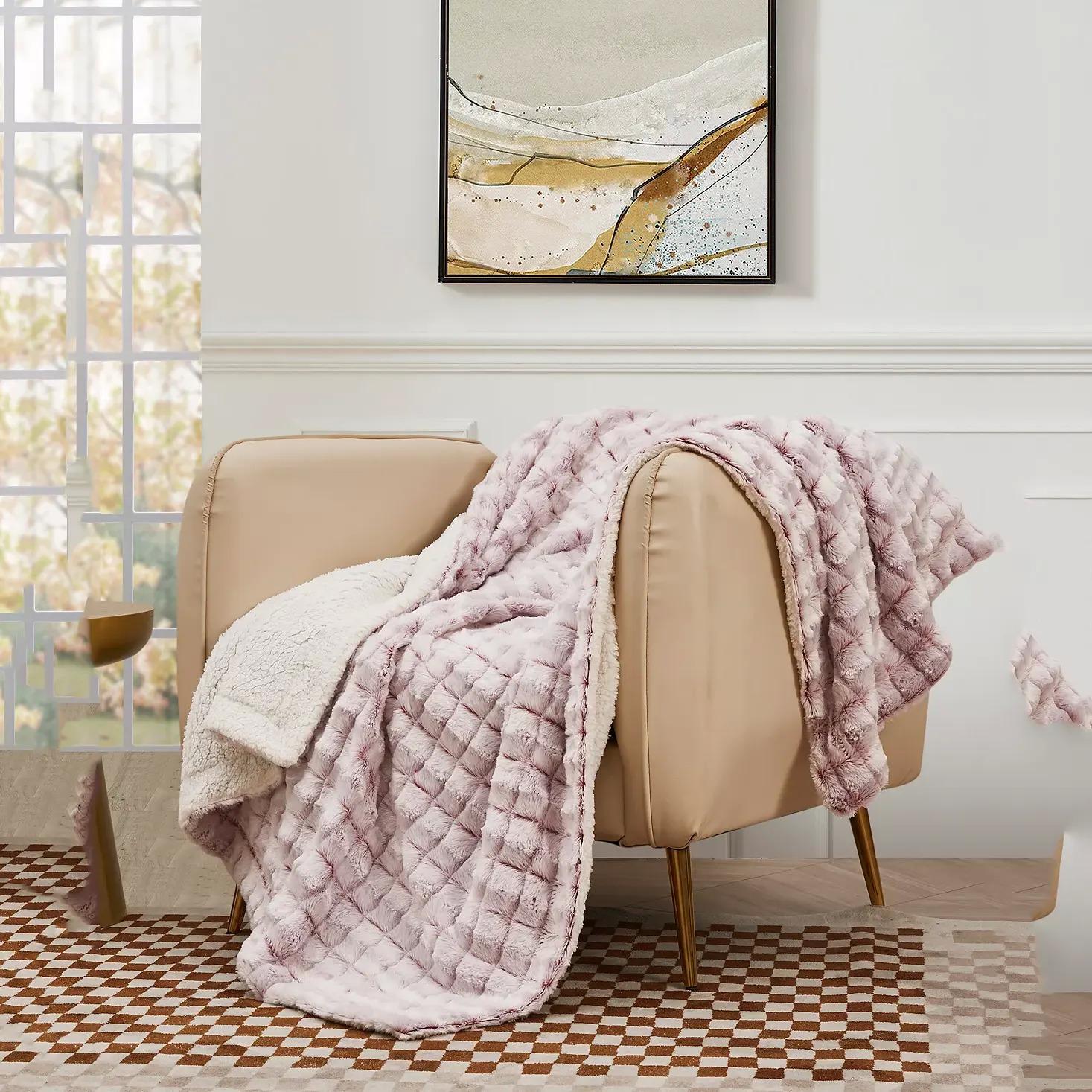50in Royal Luxe Reversible Micromink to Faux-Sherpa Throw Blanket for $11.99