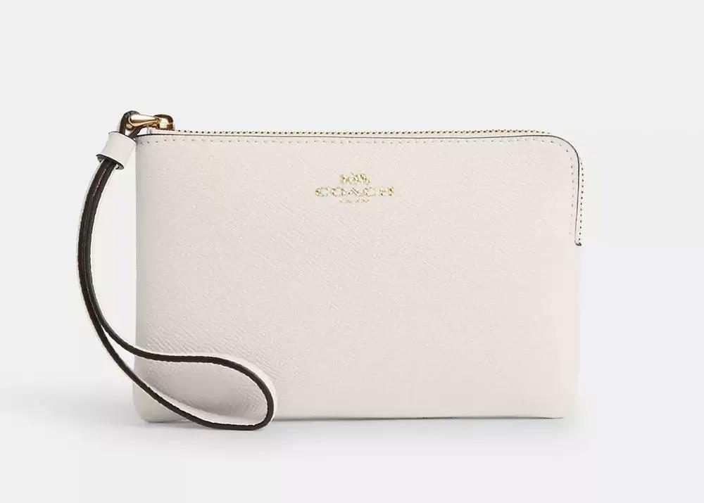 Coach Corner Zip Wristlets with Coupon Promo Code COACH15 for $24.65 Shipped